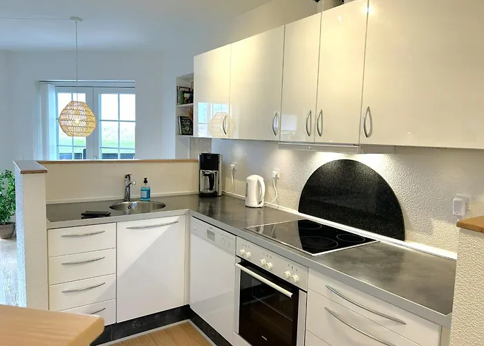 Ferielejligheden / *